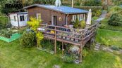 Prodej celoročně obyvatelné chaty s pozemkem 1 439 m Karlovy Vary, Doubí, cena 3650000 CZK / objekt, nabízí 